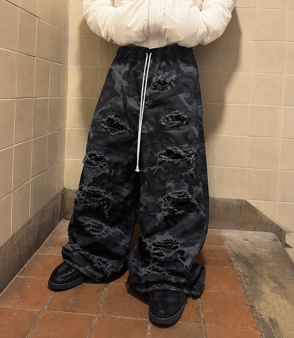Distressed camo pants